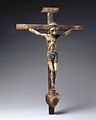 Image 28José Rafael Aragón, Crucifix, ca. 1795–1862, Brooklyn Museum, From about 1750, Catholic churches in Spanish New Mexico were increasingly decorated with the work of native craftspeople rather than with paintings, sculpture, and furniture imported from Europe. This small santo (religious image) is typical of the locally produced objects. It is made of indigenous pine and painted with water-based pigments used by native artisans. (from History of New Mexico)