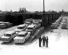 Train unloading 1958 Ramblers for a car rental company in Florida.