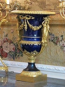 Louis XVI style caryatids on the Médicis Vase, by Louis-Simon Boizot, Pierre Philippe-Thomire and the Sèvres Porcelain Manufactory, c.1787, porcelain and gilded bronze, Louvre[23]