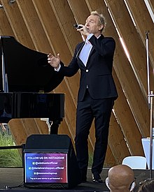Dubai-based Belgian singer Wim Hoste performing at the Belgium Pavilion at Expo 2022 in Dubai on 19 March 2022