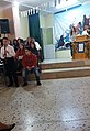 In each school of Greece, in the last working day before March 25, there is a feast in each school which includes songs, poems and other related stuff. In the upper right is shown the podium, as there are usually some students tasked with announcing the themes and the programme.