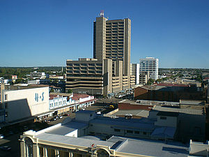 View of Bulawayo's Central Business District (CBD) from Pioneer House by Prince Phumulani Nyoni. The CBD is 5.4 square kilometres and is in a grid pattern with 17 avenues and 11 streets.