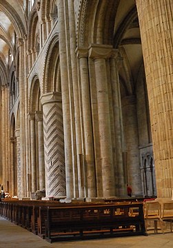 Durham Cathedral, England, has decorated masonry columns alternating with piers of clustered shafts.