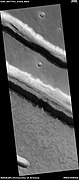 Troughs, as seen by HiRISE under HiWish program. Layers are also visible in the image.
