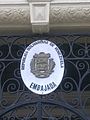 Plaque outside the embassy depicting the Coat of arms of Venezuela