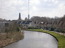 Hollandse IJssel through IJsselstein with church and Gerbrandy Tower in background