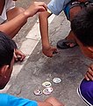 Pogs was a popular street game among children around the world during the decade