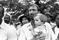 Image 2Man with child at a meeting of the Southern Tenant Farmers Union, 1937 (from History of Arkansas)