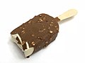 A partially eaten Häagen-Dazs vanilla milk chocolate almond ice cream bar