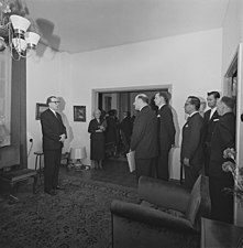 Photograph of a delegation (including L. A. Puntila [fi]) visiting professor A. I. Virtanen on his 70th birthday in 1965