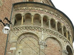 The eastern apse of Parma Cathedral, Italy (early 12th century) combines a diversity of decorative features: blind arcading, galleries, courses and sculptured motifs.