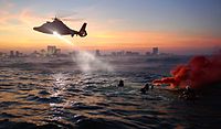 Coast Guard rescue swimmers from Coast Guard Air Station Atlantic City train off the coast of Atlantic City, New Jersey.