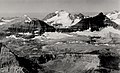 Clyde Peak (left), Blackfoot Mountain (center), Mt. Logan (right). Aerial view from northeast, circa 1925.
