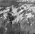 1961 aerial view of Mount Abdallah featuring Romer Glacier
