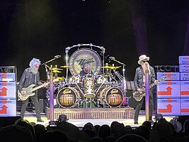 ZZ Top performing in April 2023. From left to right: Elwood Francis, Frank Beard, Billy Gibbons