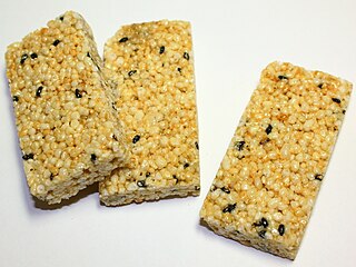 Awaokoshi, candied millet puffs, are a specialty of Osaka, Japan.