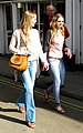 Image 32Two women wearing flared trousers, jeggings and oversized cardigans (from 2010s in fashion)