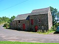The 'old stables and waulk mill' buildings.