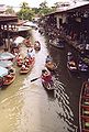 Floating market: Damnoen Saduak floating market in Ratchaburi, Thailand, is a famous tourist attraction.