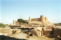 citadel in herat, july 2001. built in the fourteenth (?) century and still in use today. as it seemed to be a taliban base i thought it would be wise to hide in a bombed building while taking the photo. replaced on the herat page by another photo (which has also been removed).