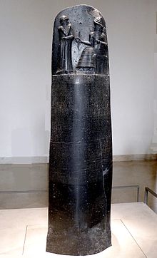 Photograph. The stele of the Code of Hammurabi in the Louvre Museum in Paris