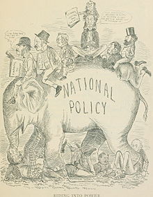 A group of men sitting on an elephant. The elephant has the phrase "National Policy" on their side