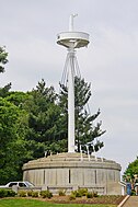 Memorial at Arlington National Cemetery centered on the ship's main mast