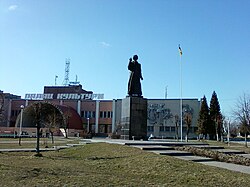 Town central square with Palace of Culture and monument to Taras Shevchenko in front