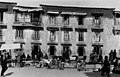 A Lhasa Newar (far left) on the Barkhor, 1938.