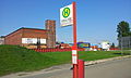 Ehemaliger Werkeingang der Howaldtswerke mit der Bushaltestelle Roßweg/HDW (Foto: Mai 2012)