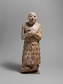 Votive figure; 2600–2350 BC; stone; height: 41.3 cm, width: 14.5 cm, depth: 13.5 cm; Metropolitan Museum of Art