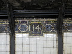 IRT mosaic trim line and frieze with number "14"