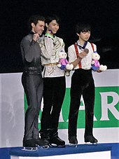 Hanyu with Jason Brown (left) and Yuma Kagiyama (right) at the 2020 Four Continents podium