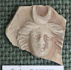 Oil lamp fragment with the head of Selene, early classical period, Musée de Die.