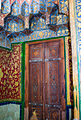 One of the doors in the religious complex, with muqarnas style above the doorway