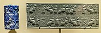 Lapis lazuli cylinder seal recovered from tomb PG 800, inscription U-bara-ge[21]