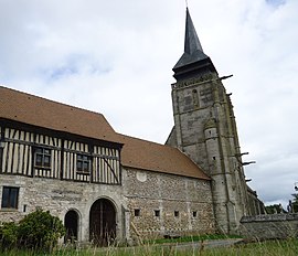 The church and farm in Le Mesnil-Jourdain