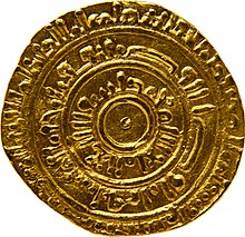 Gold coin with circular Arabic inscriptions
