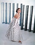 Hepburn wears a Givenchy gown in a promotional photograph for Funny Face (1957)