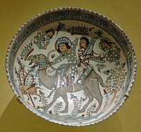 Bowl with a hunting scene from the tale of the 5th-century king Bahram Gur and Azadeh, mina'i ware.