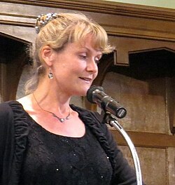 Emma Neale, reading poetry in Dunedin in March 2016