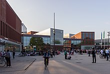 Aalto University's Väre-building and the University Plaza.