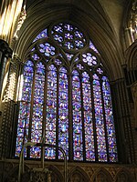 One of England's largest windows, the east window of Lincoln Cathedral, Ward and Nixon (1855), is a formal arrangement of small narrative scenes in roundels