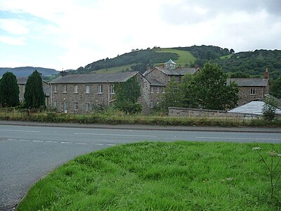 Buildings originally built as Llanfyllin workhouse, a state-funded home for the destitute which operated from 1838 to 1930.[92][93]