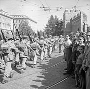 Men of 1st Battalion, The Duke of Wellington's Regiment marching into Rome, 8 June 1944