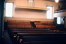 Sounding board and benches for Quakers in large open room