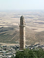 View from Mardin (Turkey) to the Mesopotamian plains with the minaret of the Reyhane Mosque in front.