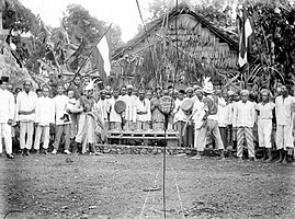 Group portrait of Ambonese with musical instrument of Kulintang in Ambon, Maluku, Indonesia. between 1900 and 1940