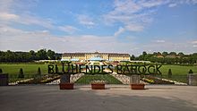 Ludwigsburg Palace, again seen from the south garden. In the center of the image is a hedge cut to form the words "Blühendes Barock", meaning Blooming Baroque.
