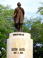 Statue in the municipality of Castro Alves, Bahia, with the first verse of O Navio Negreiro: "'Stamos em pleno mar" (We are in the middle of the sea)